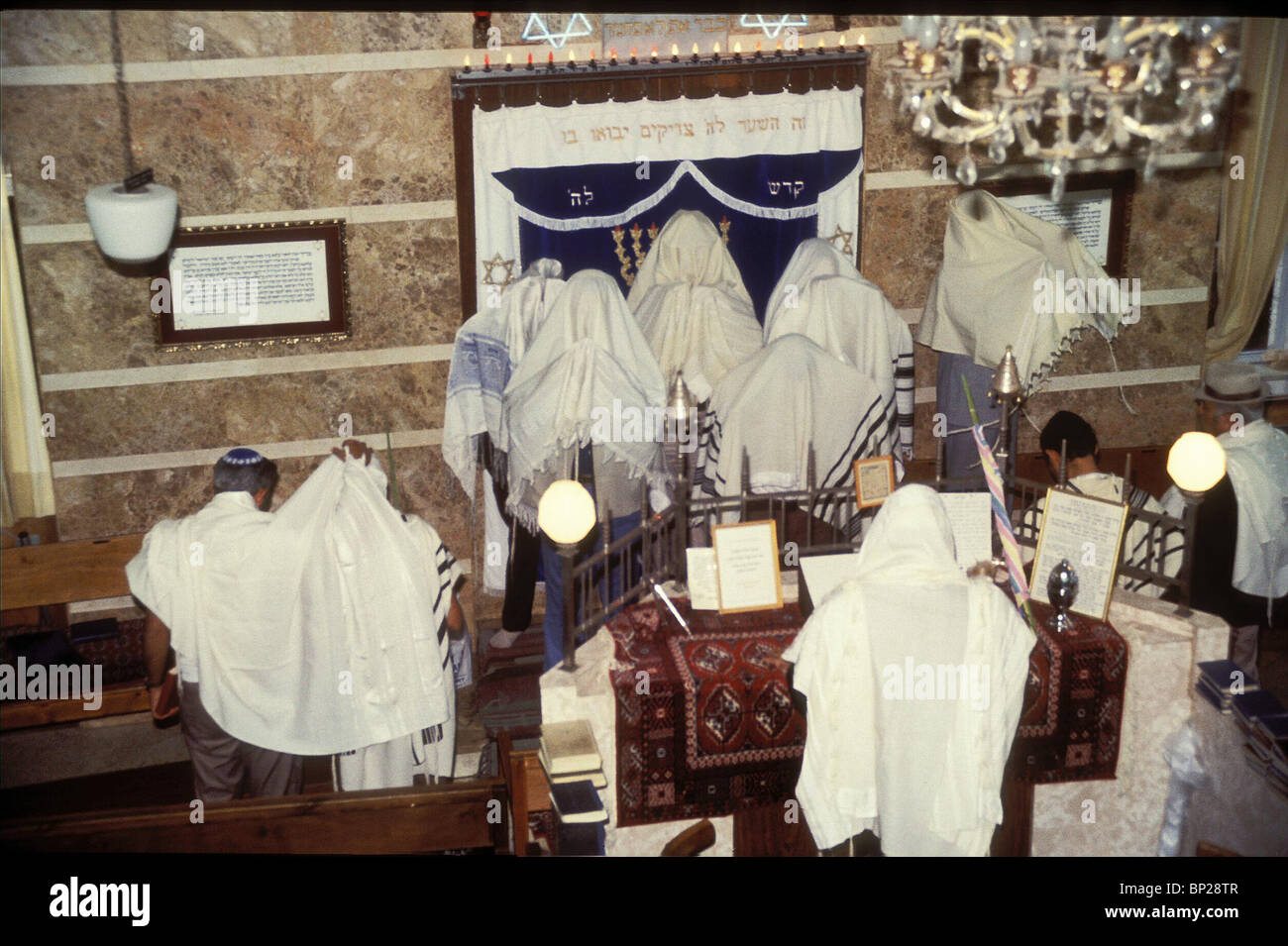 PRIESTLY BENEDICTION (BIRKAT KOHANIM NUM 6:24-26) PERFORMED IN A JERUSALEM SYNAGOGUE AT THE MORNING PRAYER. THE 'PRIESTLY Stock Photo