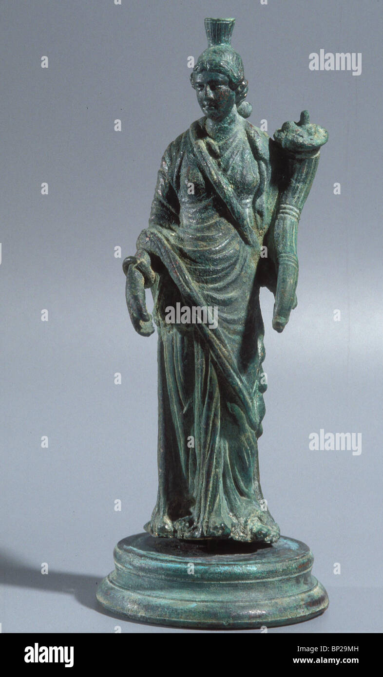 BRONZE FIGURINE OF THE ROMAN GODDESS FORTUNA HOLDING THE 'HORN OF PLENTY' A SYMBOL OF FORTUNE & WEALTH. FORTUNA IS IDENTIFIED Stock Photo