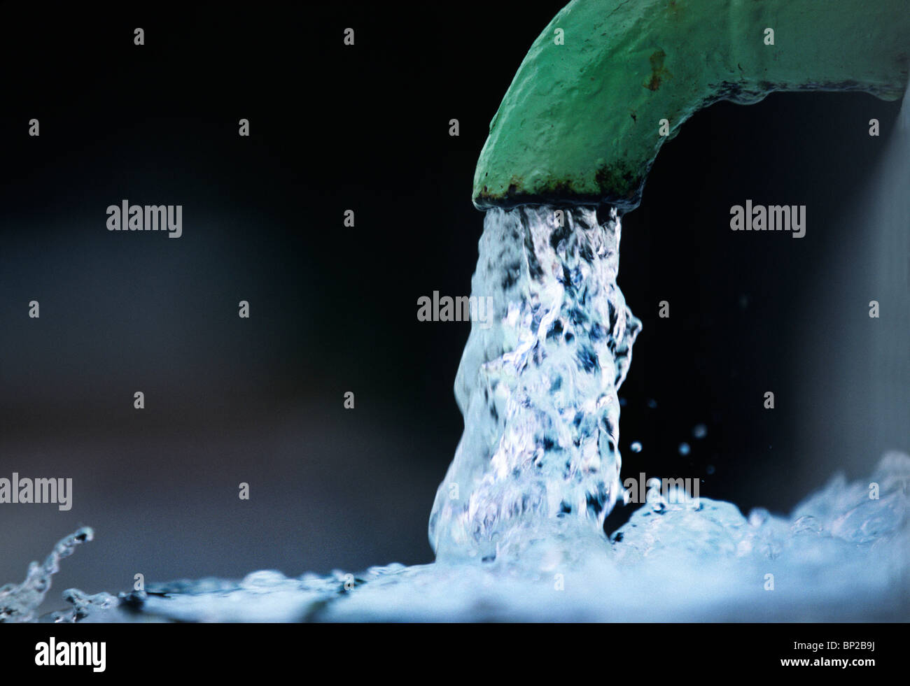 A closeup shot of water running from a tap Stock Photo