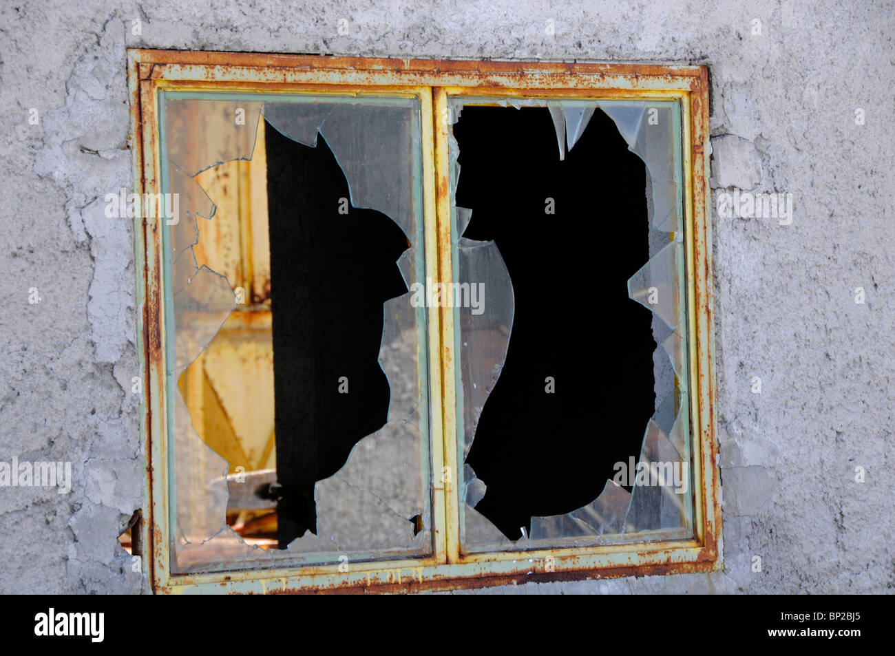 Broken Windows. Disused Factory, Crete, Greece Stock Photo