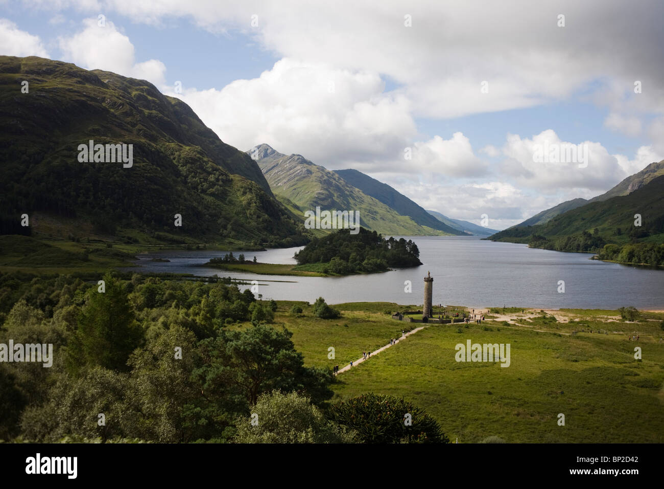 Tourists on Glenfinnan Monument built where Scottish Jacobite Bonnie Prince Charlie first raised