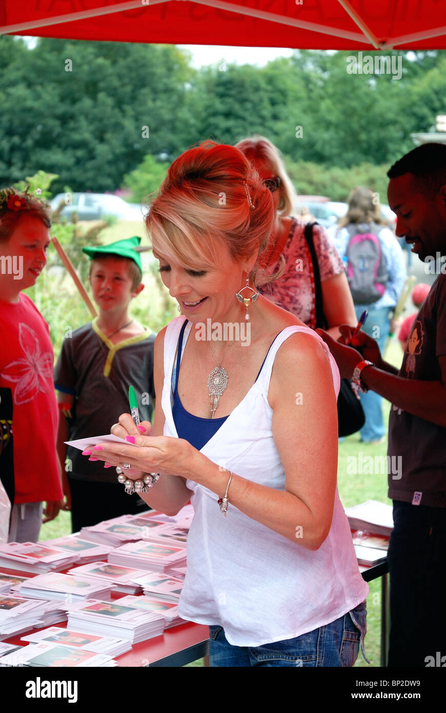 Anne Davies newsreader and tv presenter signing autographs at the Robin Hood Festival 2010 Sherwood forest Nottinghamshire Stock Photo