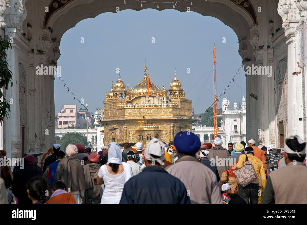 Sikh pilgrims visiting the Golden Temple. Amritsar. Punjab Stock Photo