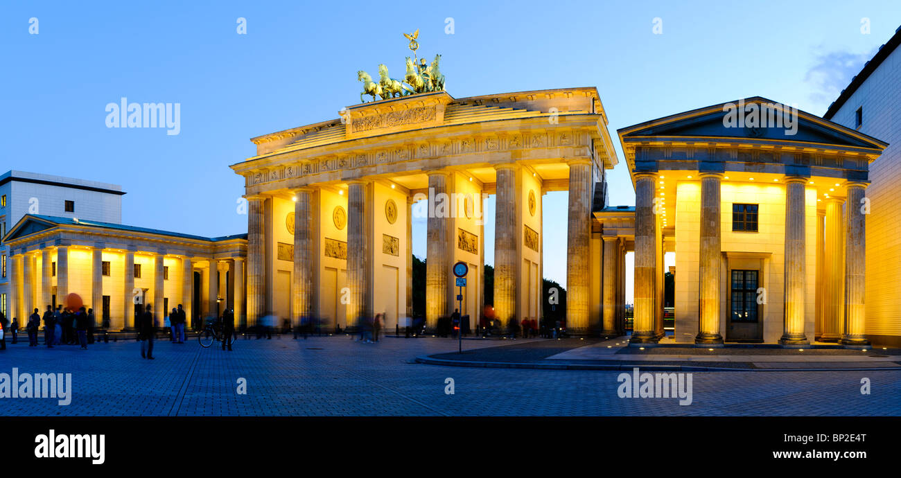 Panorama of evening view of the Brandenburg Gate, one of Europe's and the world's most recognizable and historic landmarks. Stock Photo