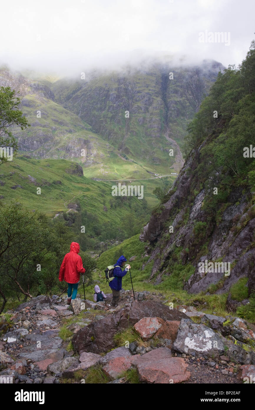 Walkers descend Glencoe's Lost Valley (in Gaelic Coire Gabhail Stock