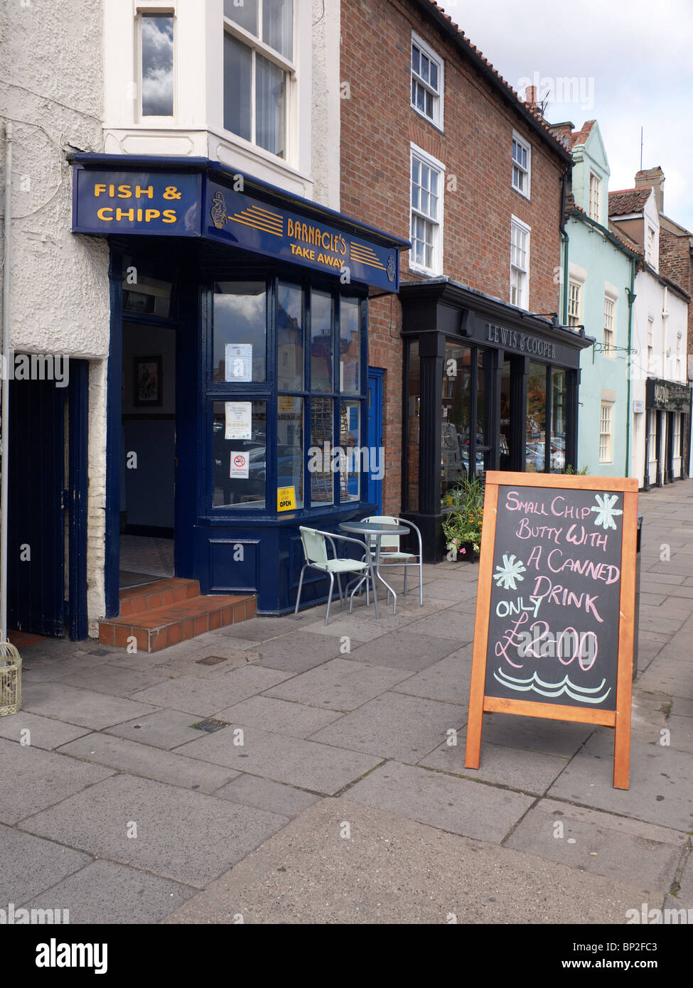 Fish and Chip shop in Yarm High Street with a sign for 'Chip Butty and a canned drink' Stock Photo