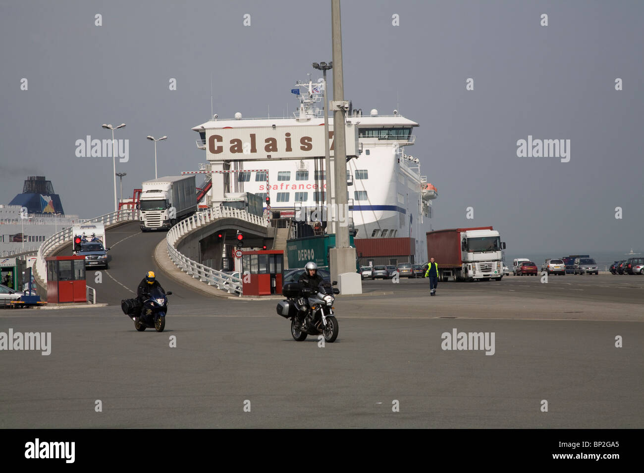 Calais France Europe EU Motorbikes cars and lorries disembarking from a Sea France Ferry in the Port Stock Photo