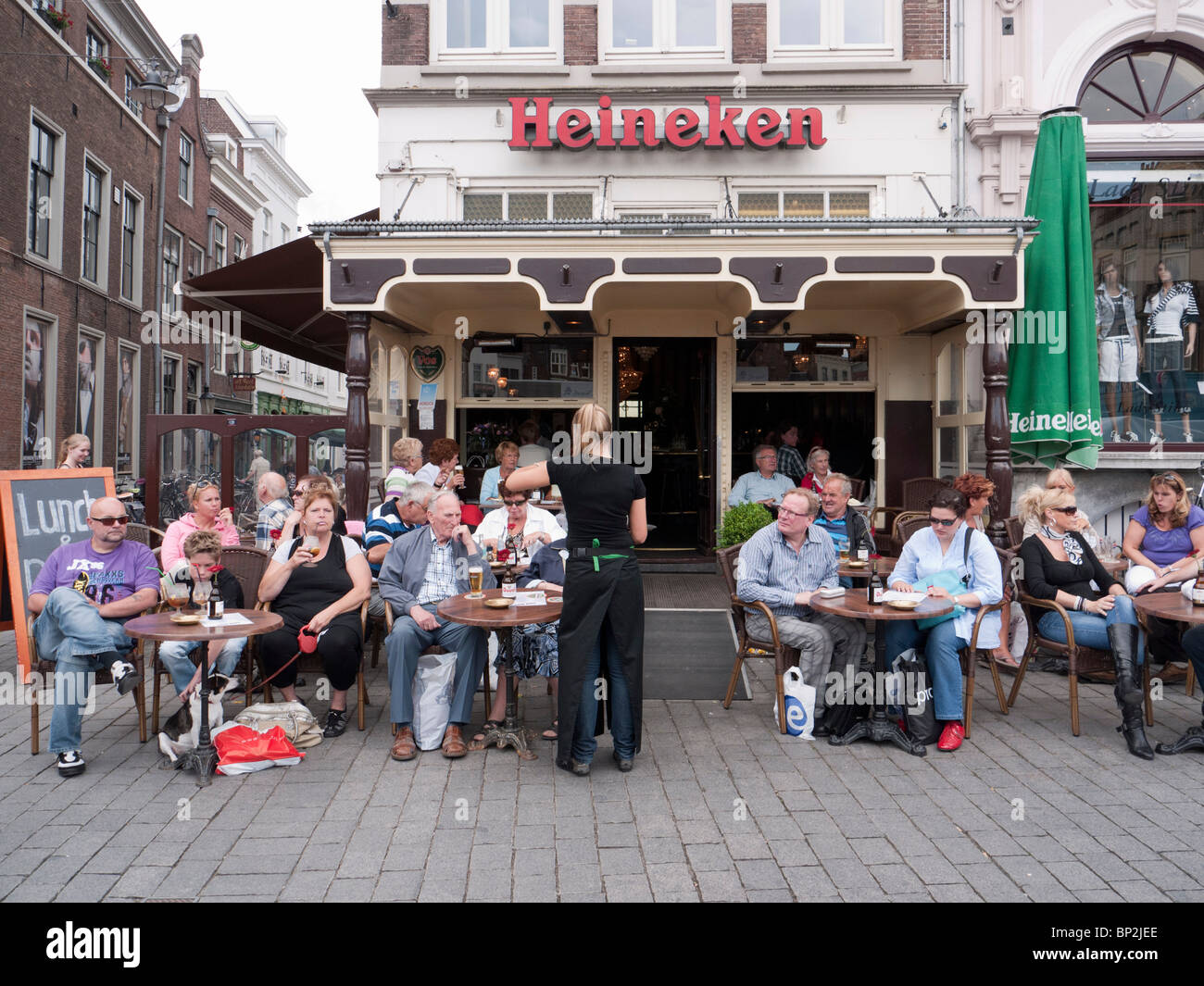 Busy cafe in city square in Den Bosch or Hertogenbosch in The Netherlands Stock Photo