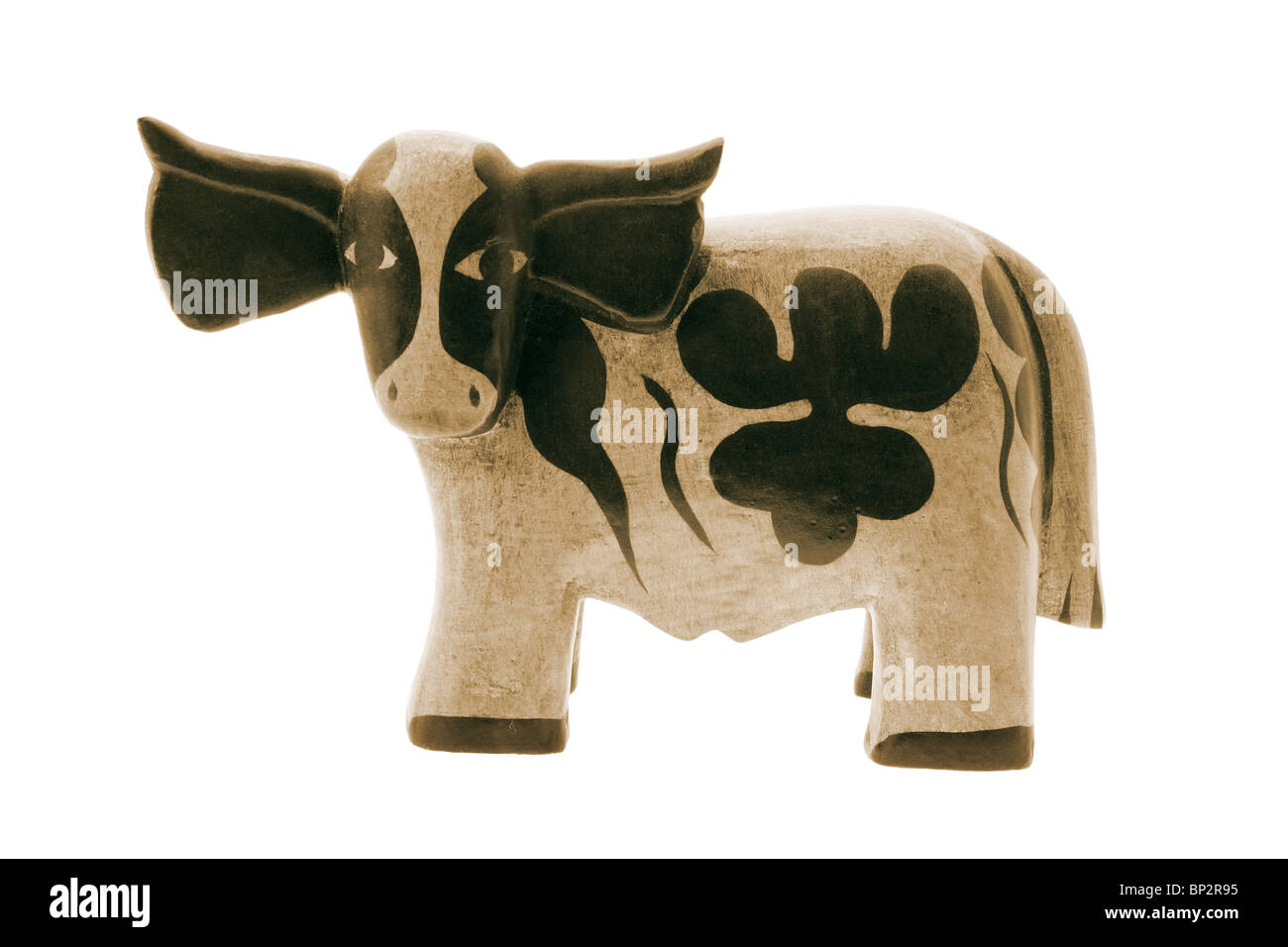 Wooden Cow Figurine Stock Photo