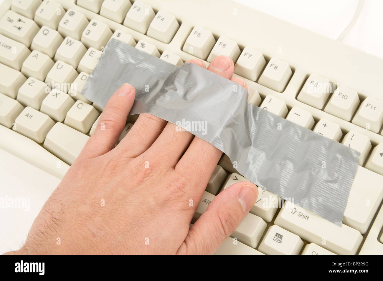 Hand had been stuck on Computer Keyboard Stock Photo Alamy