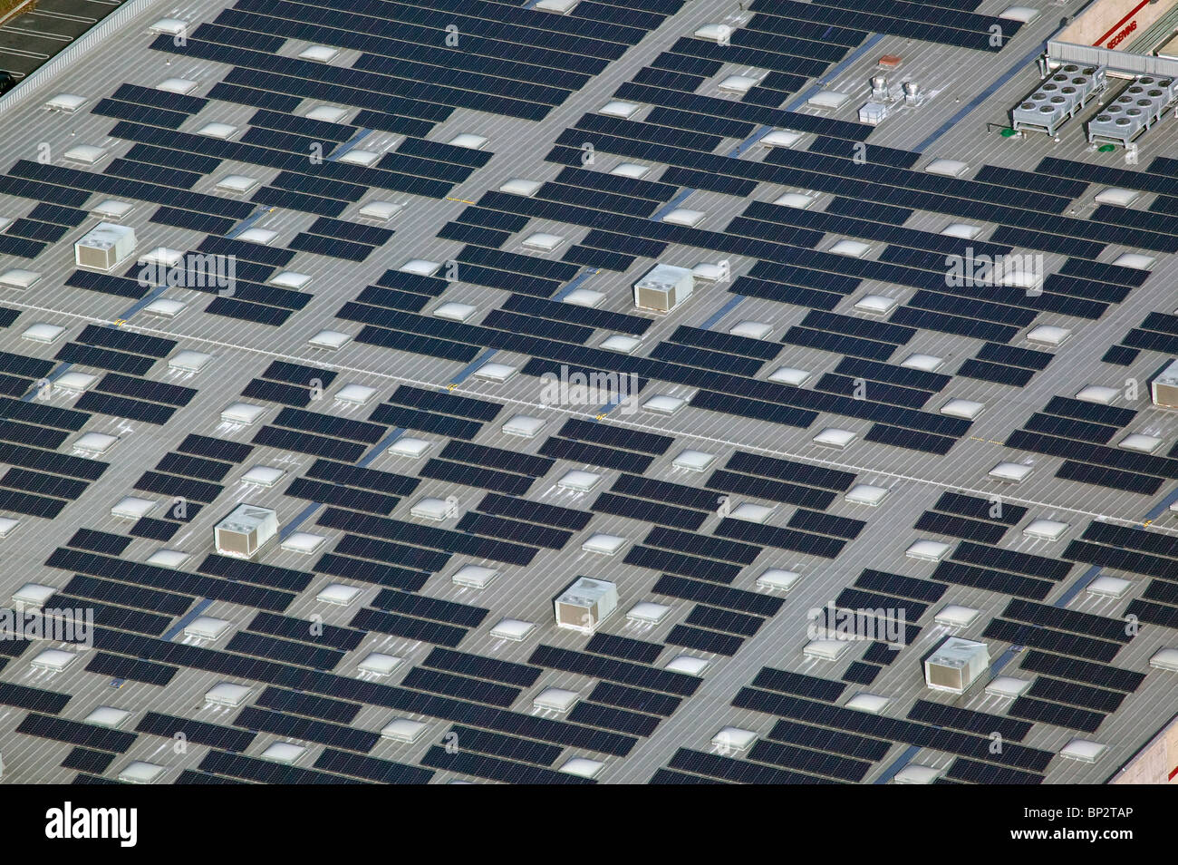 aerial view above solar power panels Costco warehouse rooftop Richmond
