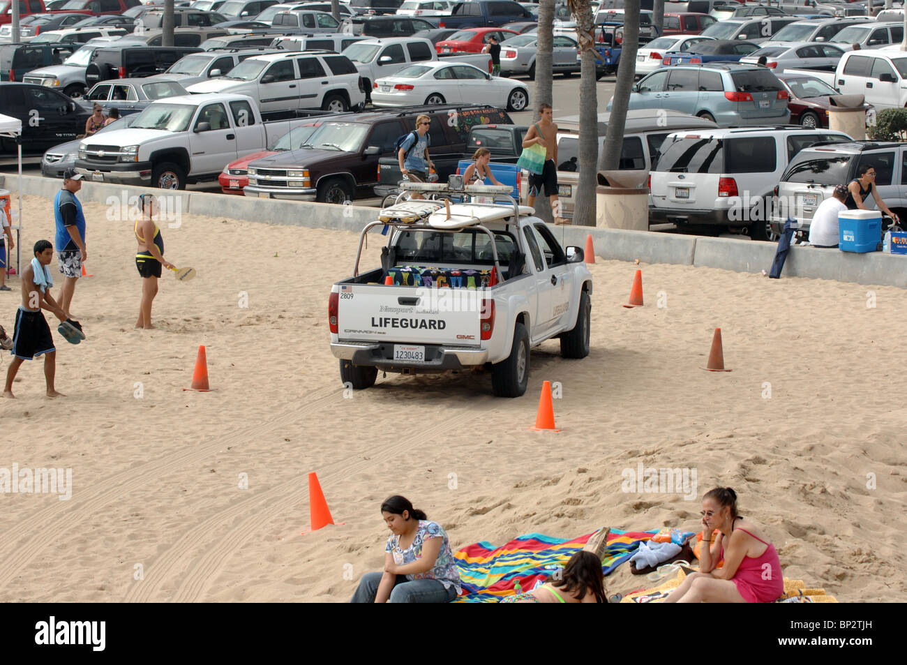 Lifeguard response vehicle driving near the shoreline at Newport Beach, California Stock Photo