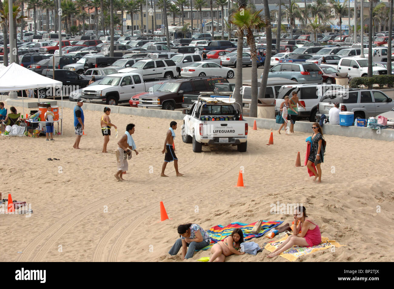 Lifeguard response vehicle driving near the shoreline at Newport Beach, California Stock Photo