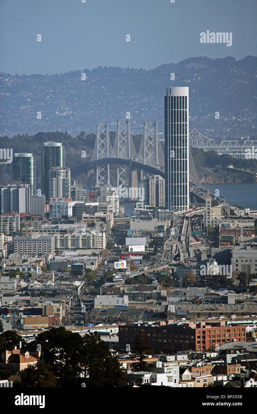 aerial view above One Rincon Hill tower Bay bridge skyline San Francisco California Stock Photo