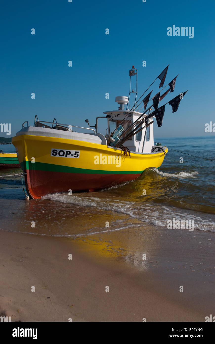 Fishing boat at the beach in Sopot, Poland. Stock Photo
