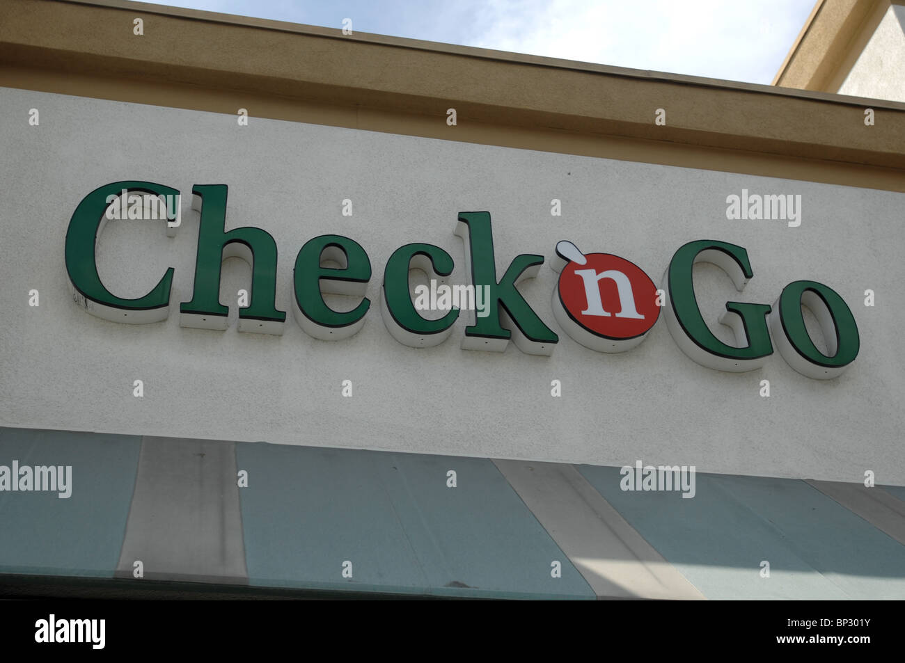 A Check & Go store in Orange, CA offers payday loans and other high-interest financial service targeting low income people. Stock Photo