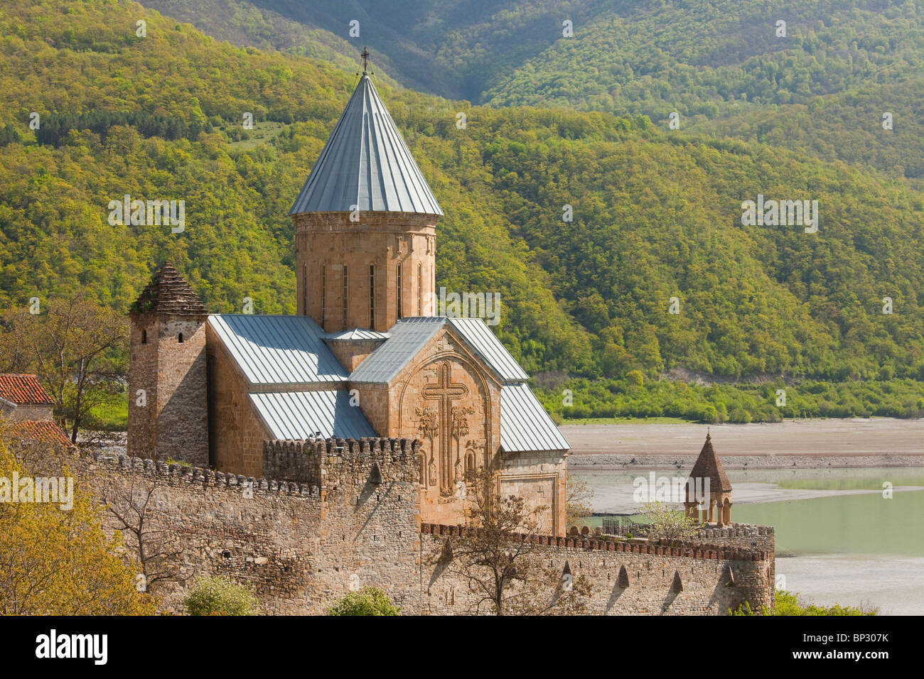 Ananuri - a mainly 17th century defensive and religious complex in the Aragvi River Valley, with wooded hills beyond; Georgia. Stock Photo
