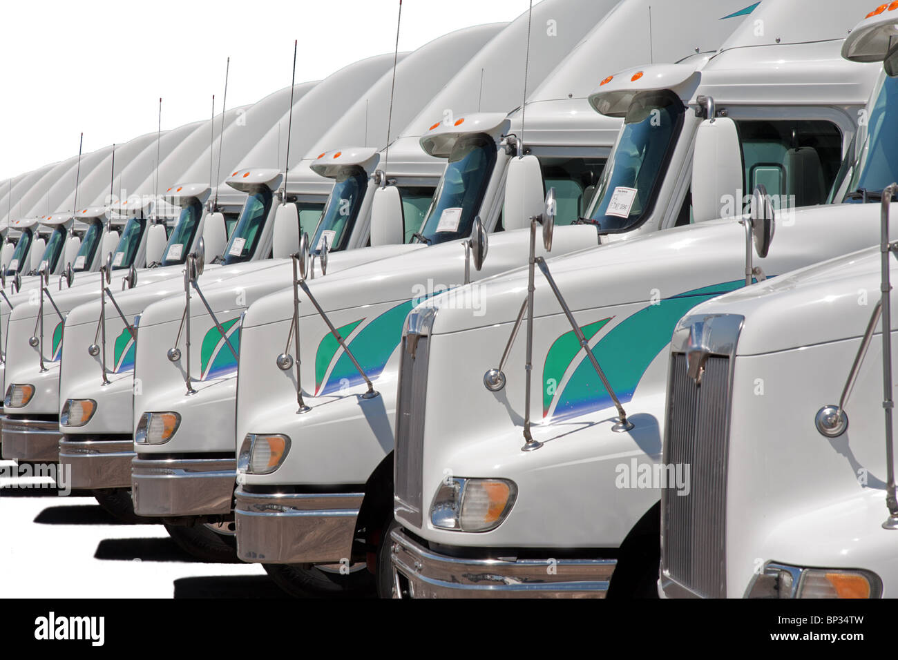 Semi Truck fleet isolated on white (255, 255, 255) Stock Photo