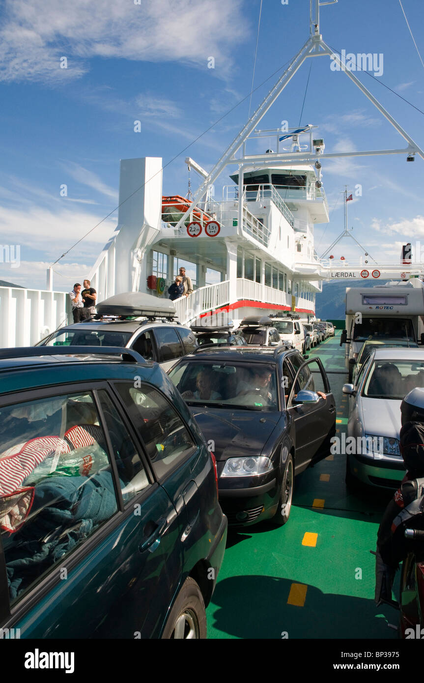 Cars and tourist vehicles on board a ferry in Norway, Summer Stock Photo