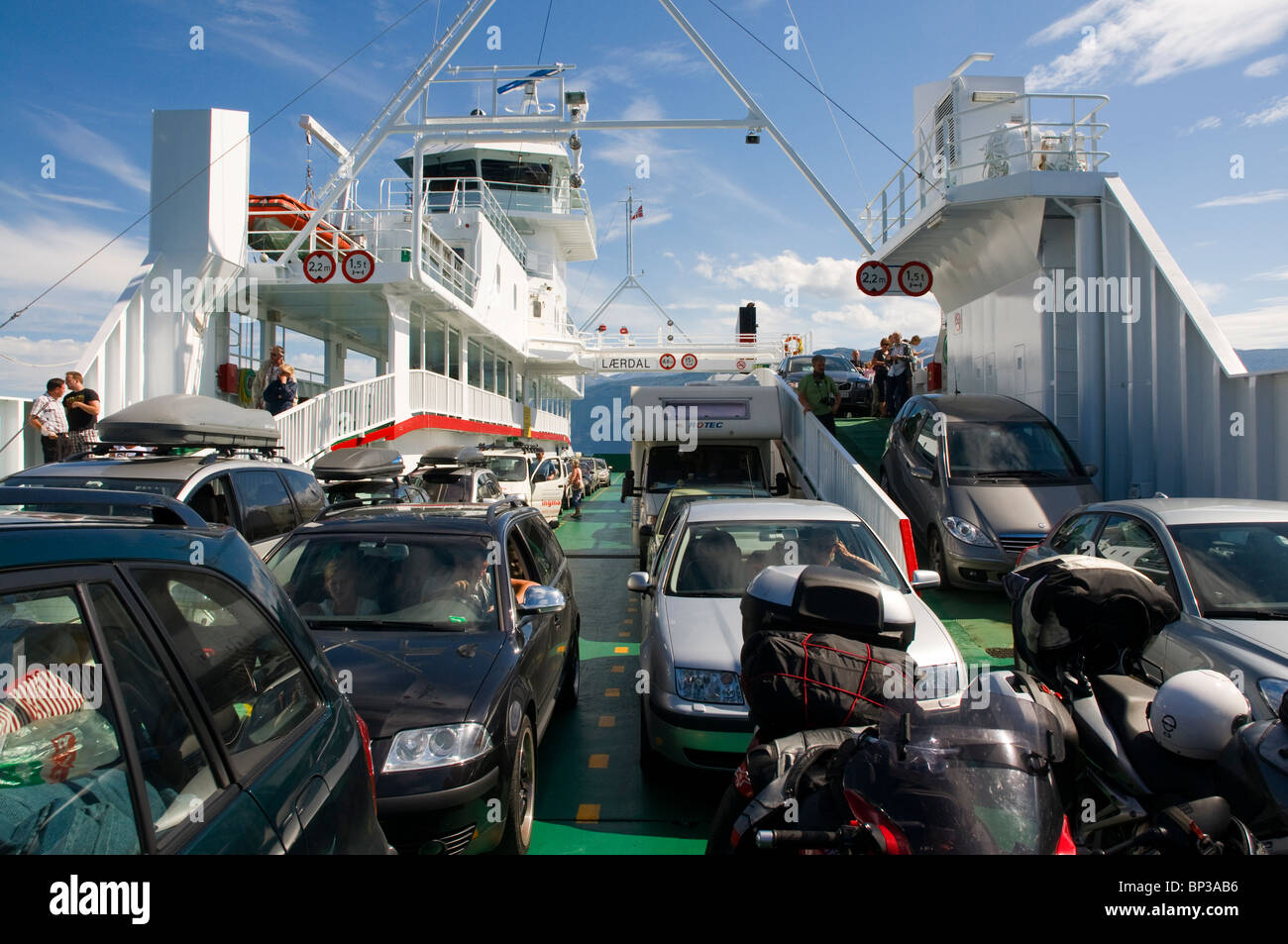 Cars and tourist vehicles on board a ferry in Norway, Summer Stock Photo