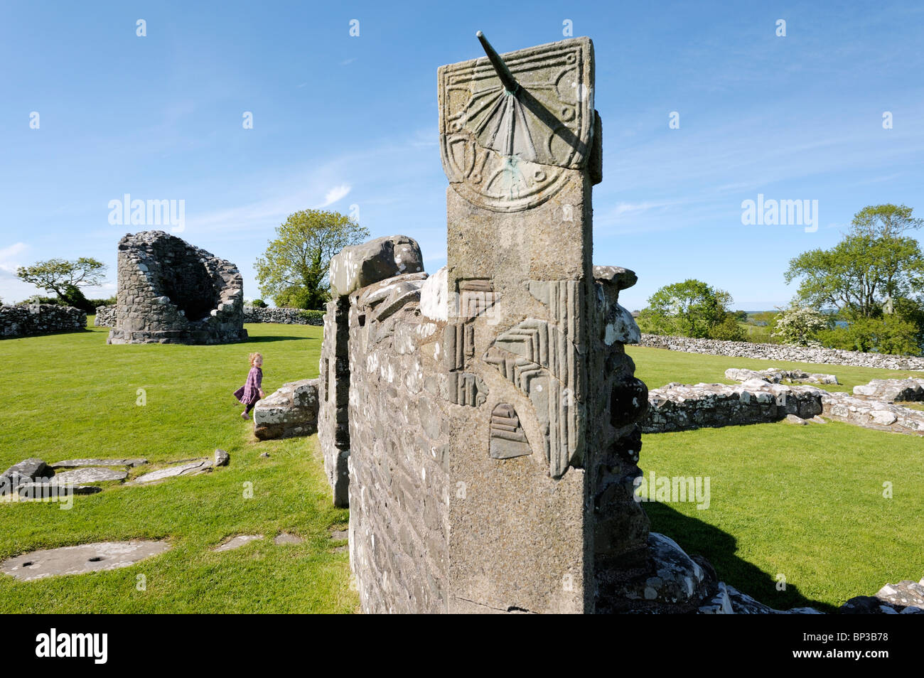 Stump of the Round Tower and mediaeval sundial of Nendrum Monastery, Mahee Island, Strangford Lough, Co. Down, Northern Ireland Stock Photo