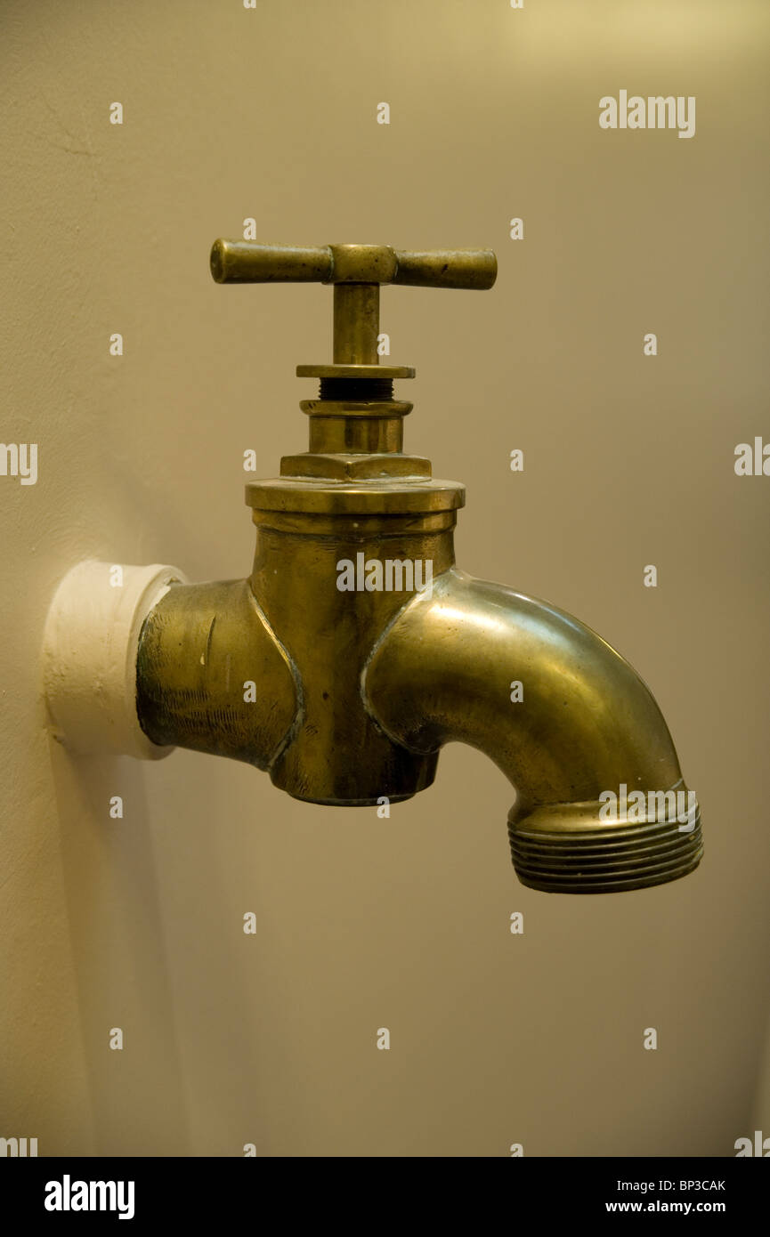 Large tap in art gallery Stock Photo