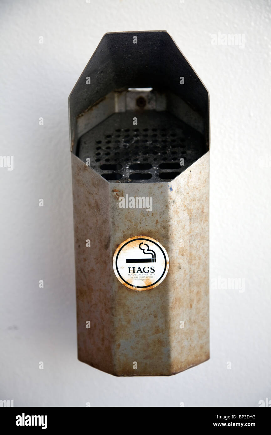 Cigarette ashtray wall mounted Stock Photo - Alamy