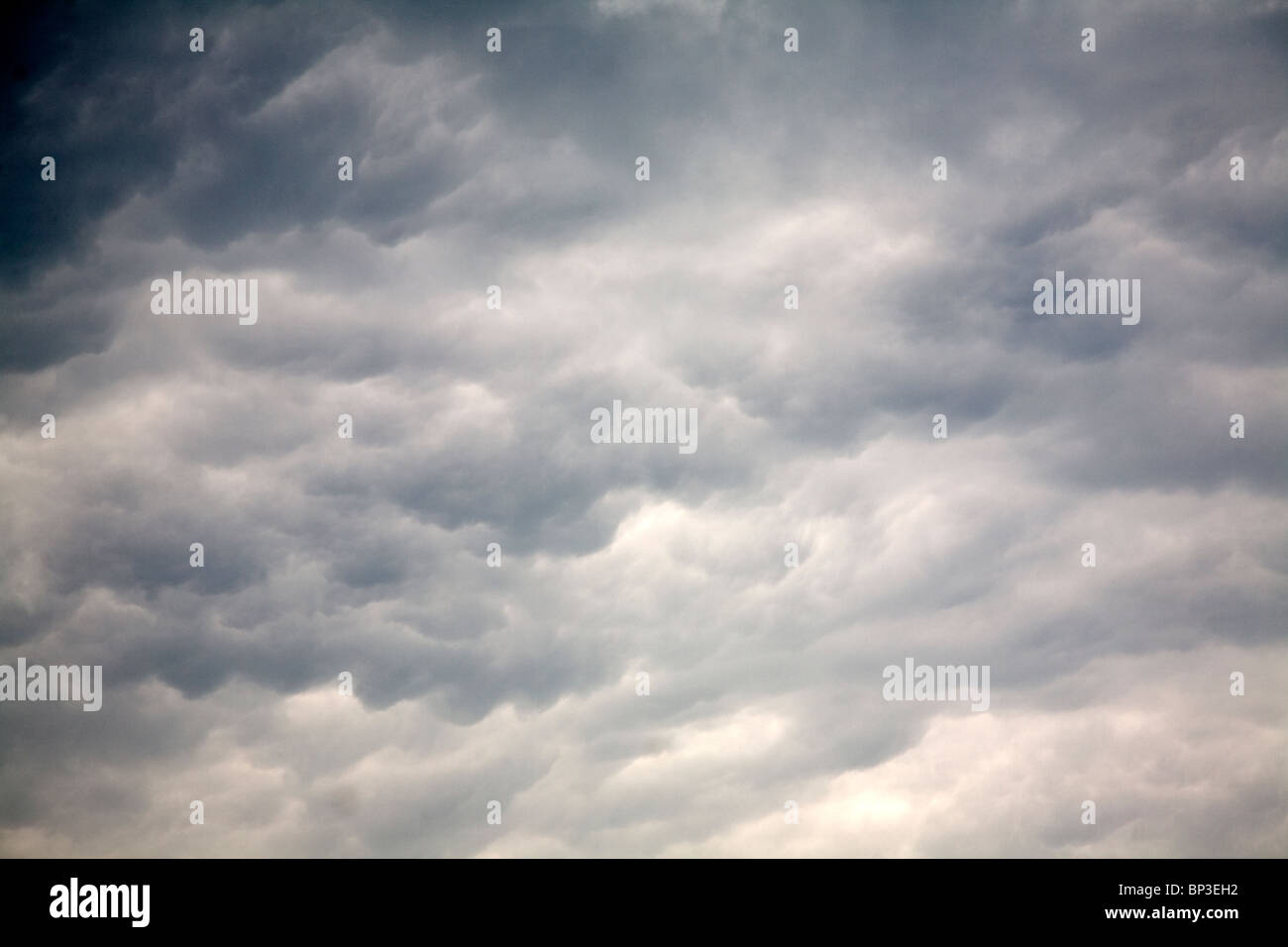 Undulating disturbed storm clouds storm approach Stock Photo