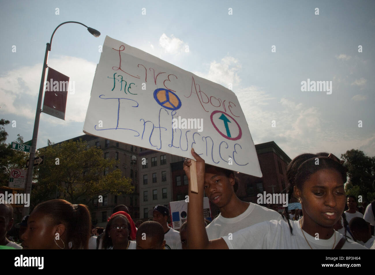 Hundreds march through the streets of Harlem in the Harlem Children's