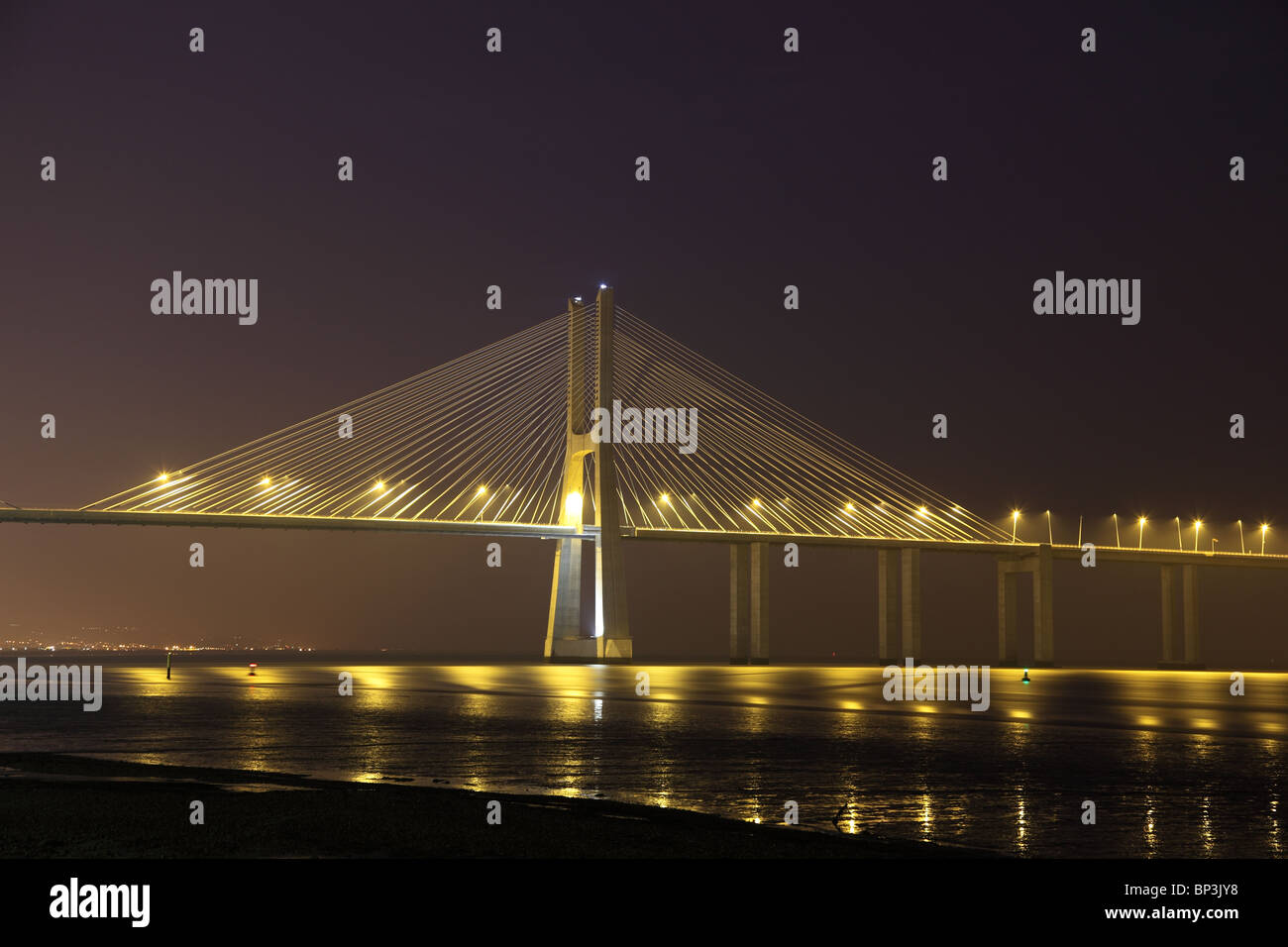 Vasco da Gama bridge illuminated at night, Lisbon Portugal Stock Photo