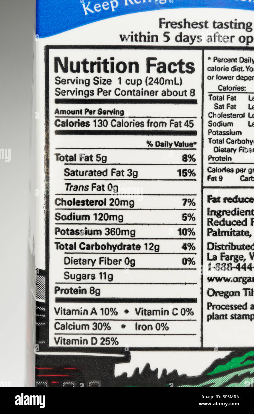 The nutrition label from a carton of organic, low-fat milk. Stock Photo