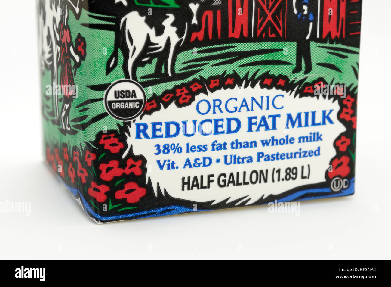 Carton of milk labeled as organic and reduced fat. Stock Photo