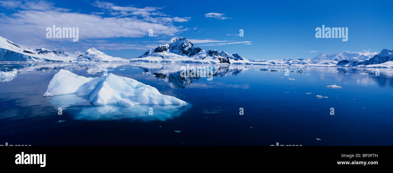 Antarctica, Paradise Bay, Glacier-covered peaks on Bryde Island reflected in still waters along Antarctica Peninsula Stock Photo