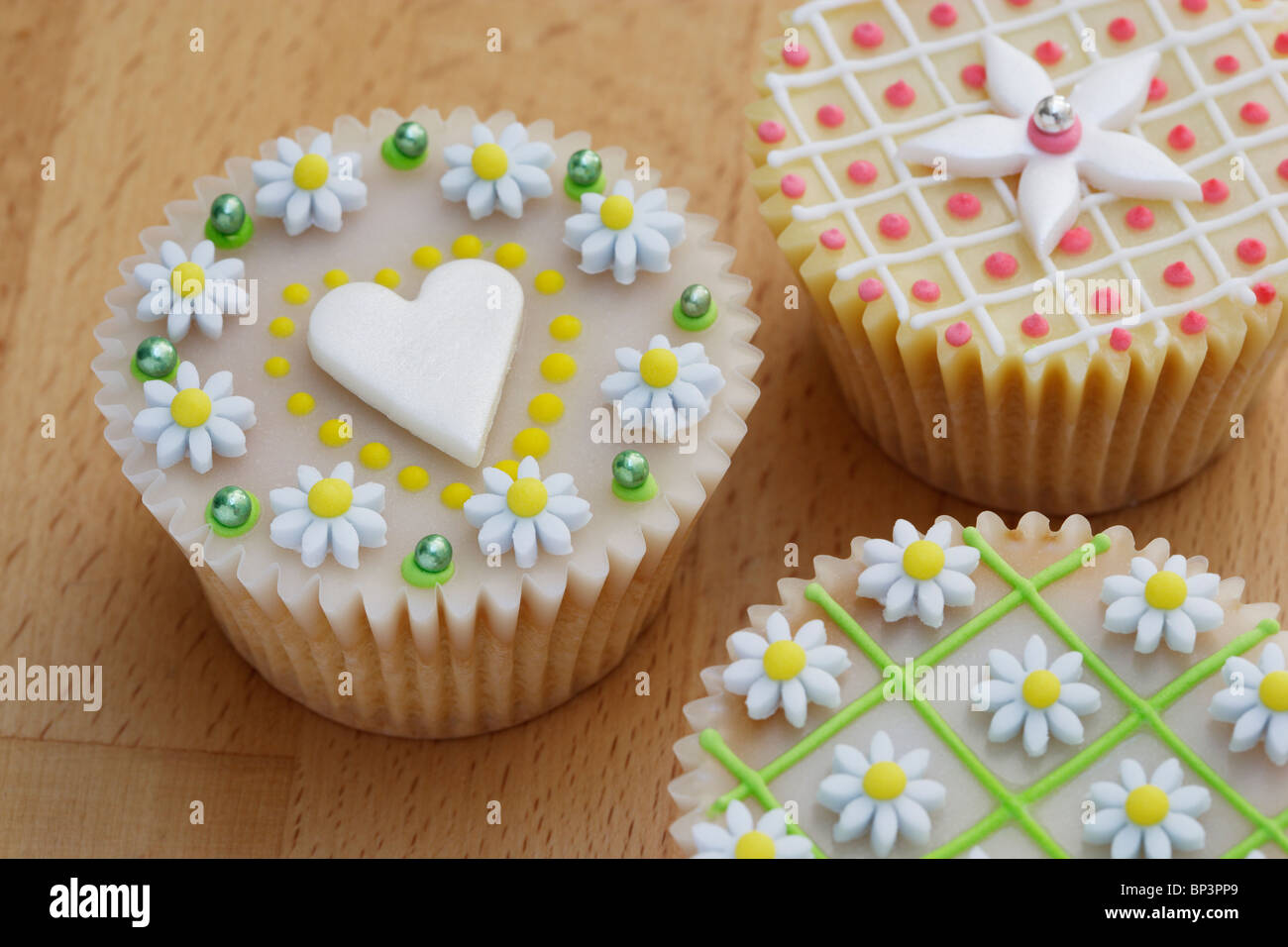 Highly decorated cup cakes Stock Photo