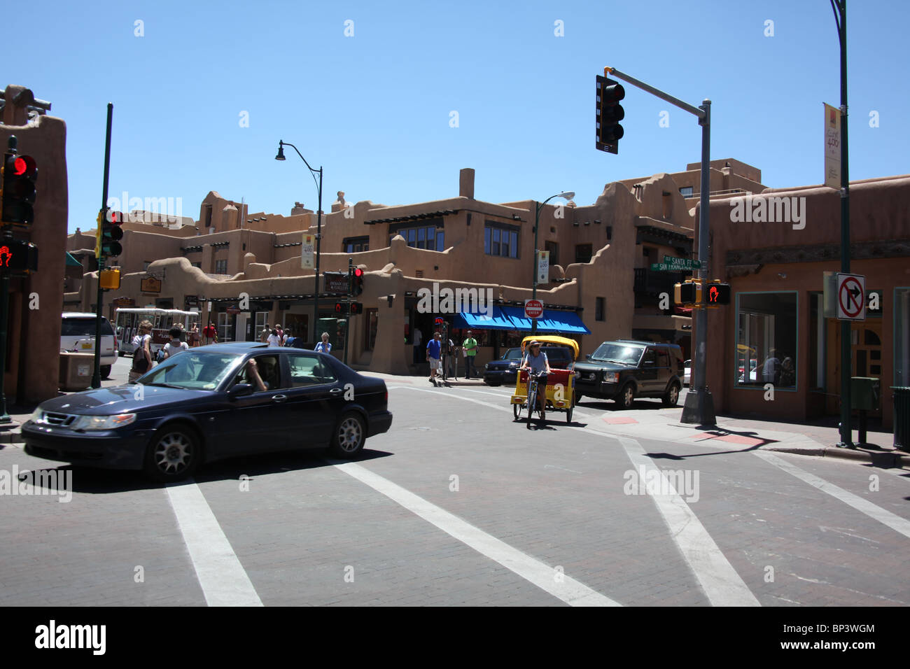 Quadricycle tour operator, traffic and people in Santa Fe Plaza ...