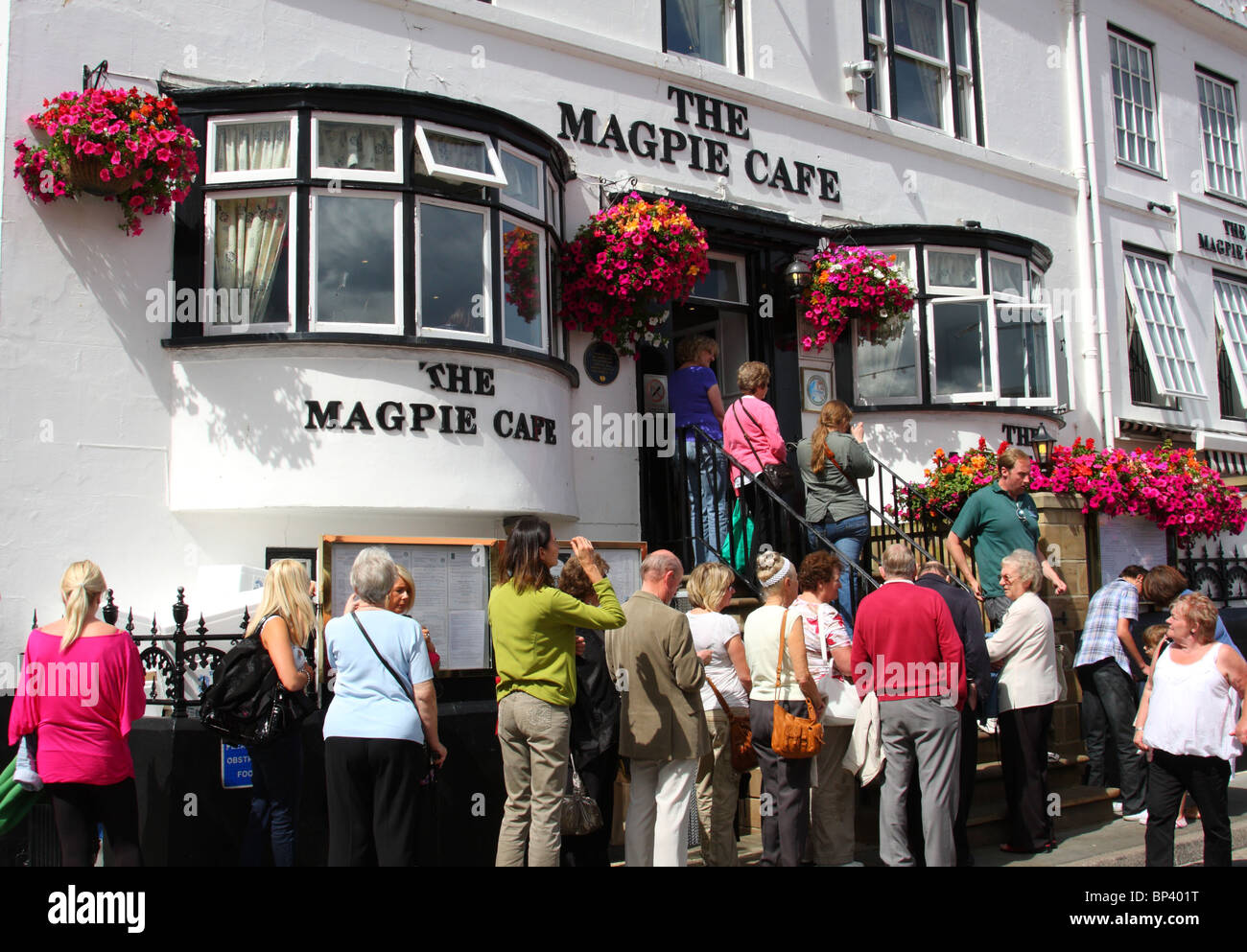 Queuing at The Magpie Cafe in Whitby. Stock Photo