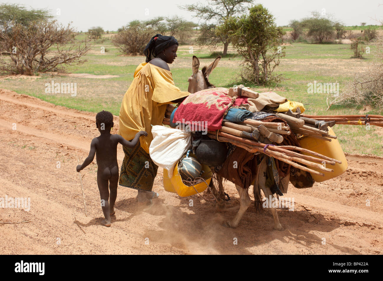 Woman And Burdened Donkey Hi-res Stock Photography And Images - Alamy