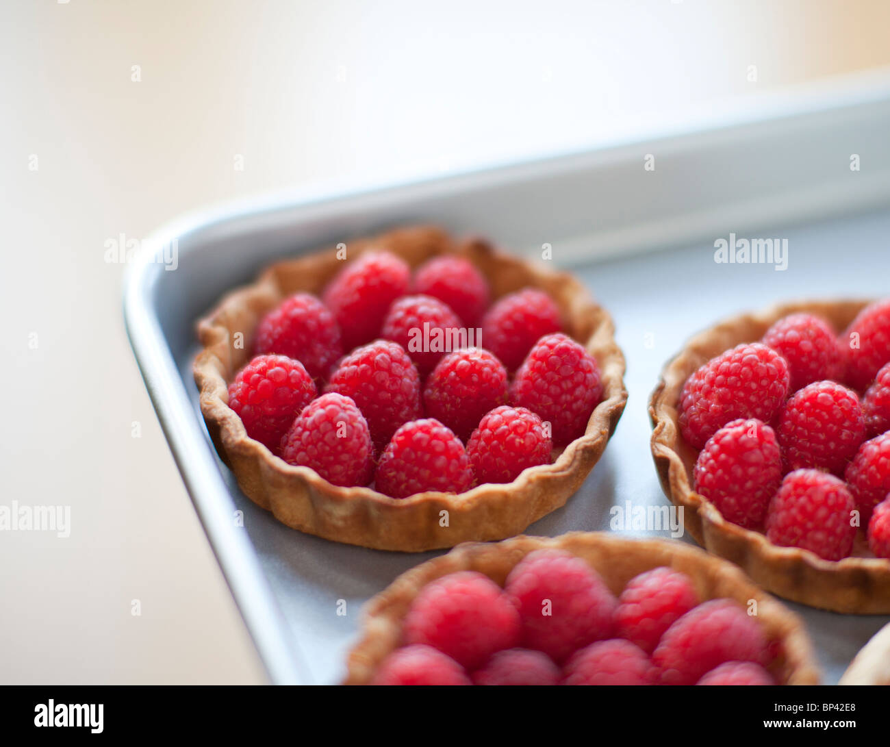 Close-up of Raspberry Tarts Stock Photo