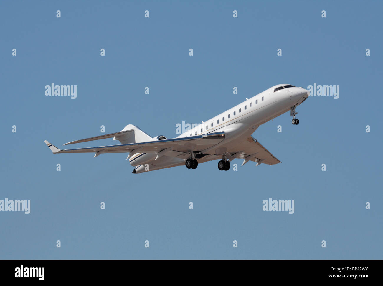 Business jet taking off. Executive air travel. Proprietary details deleted. Stock Photo