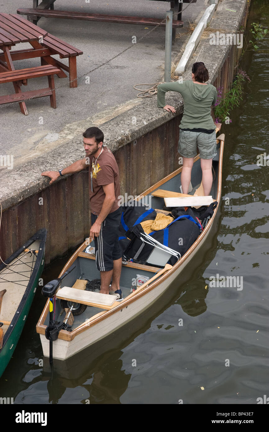 canoing canoeist mooring happy visit pub river bow Stock Photo