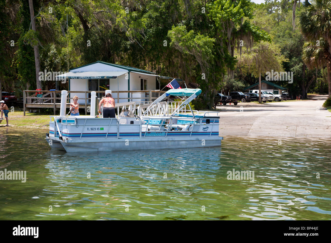 Salt Springs, FL May 2010 Two women launching pontoon boat at Salt