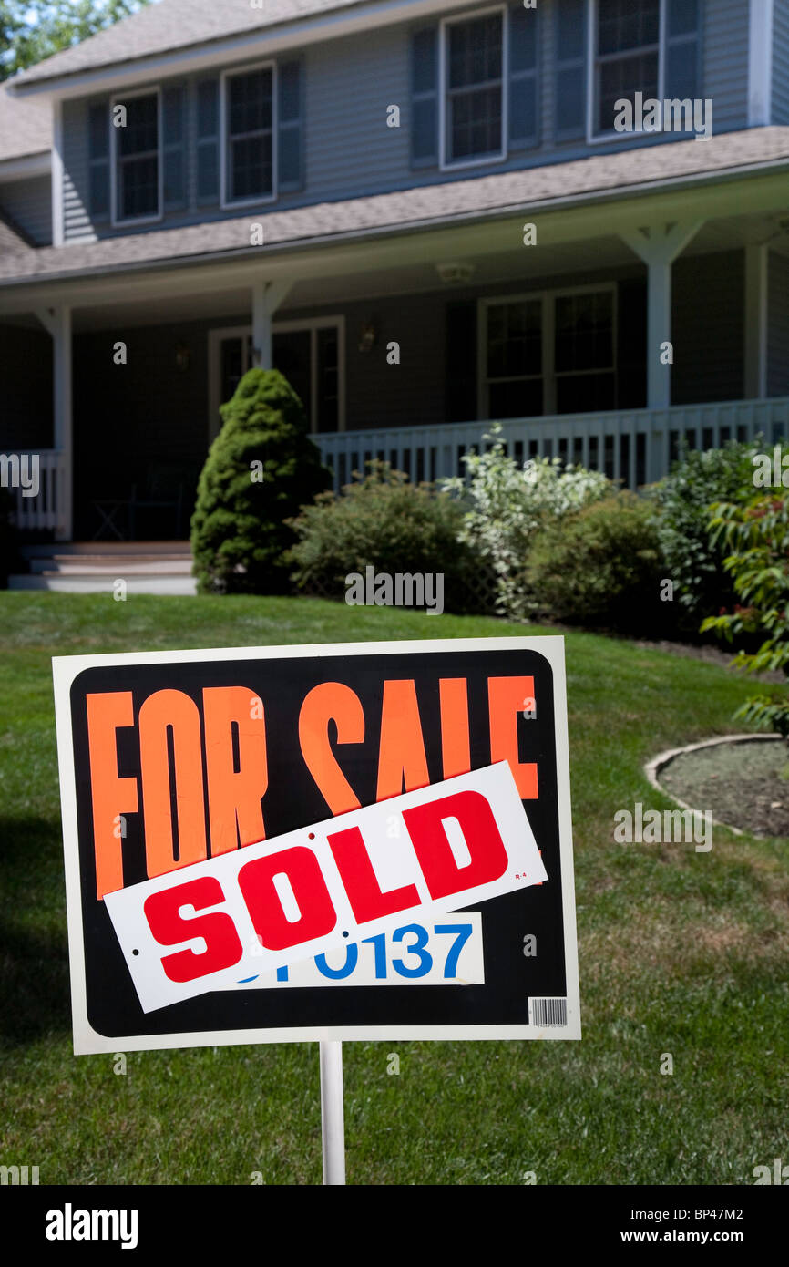 Showcase House with Sold Sign Stock Photo