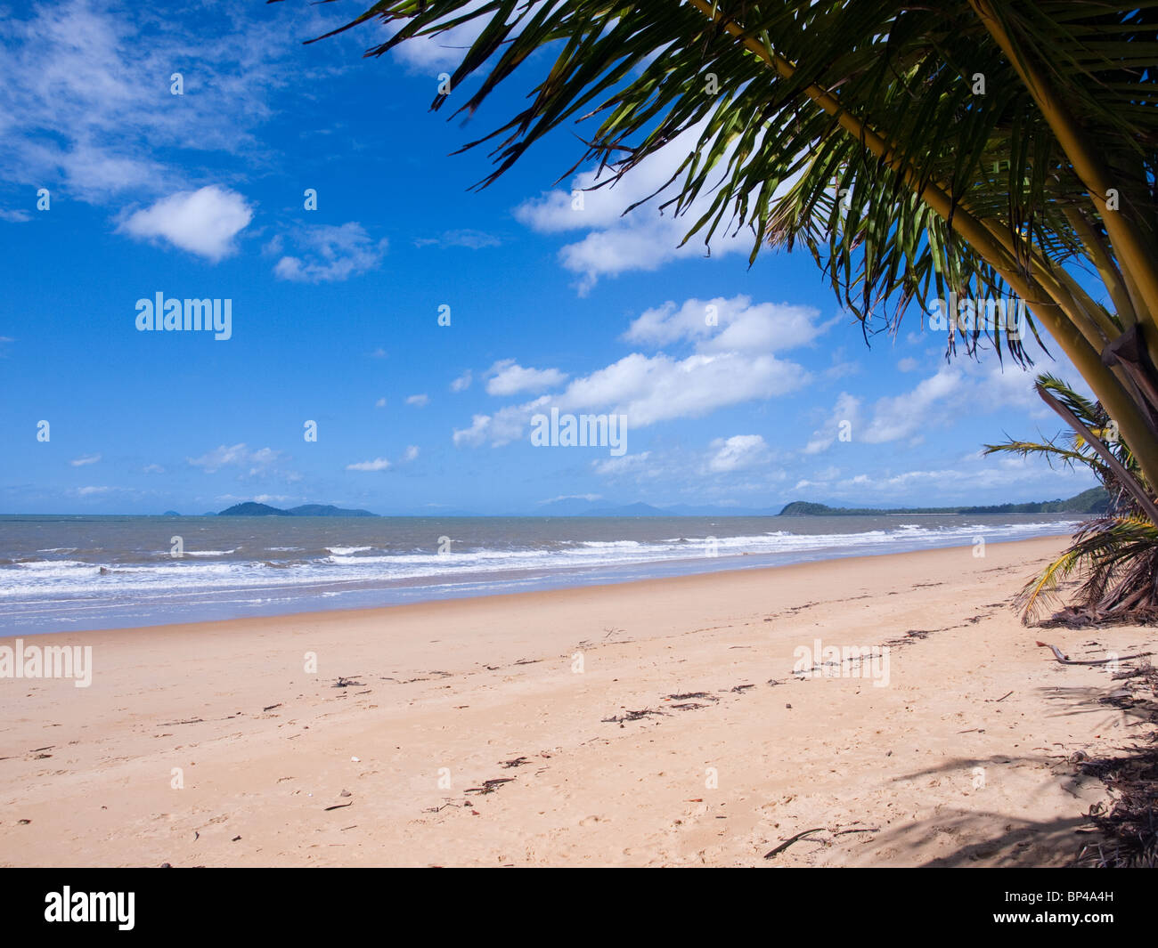 The calm surf at South Mission Beach, Queensland, Australia. Stock Photo