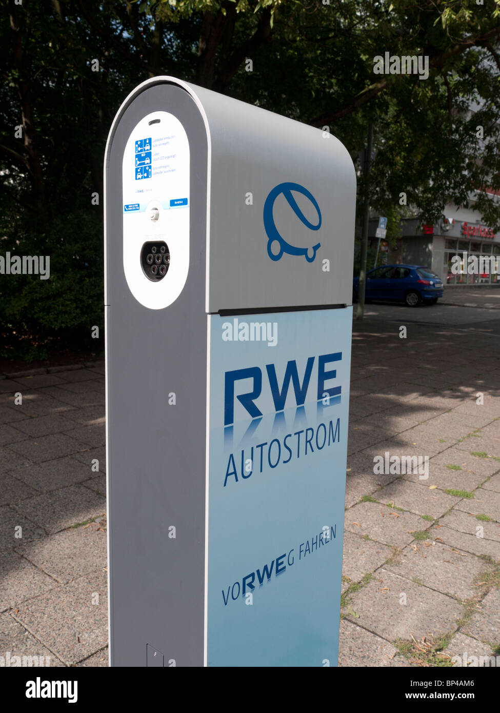 New electric car plug-in recharging station operated by RWE on Berlin street Germany Stock Photo