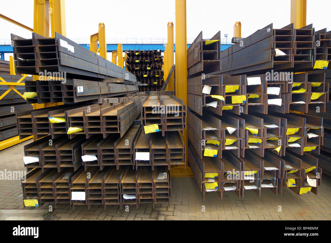 Imported steel girders stacked at the docks Stock Photo