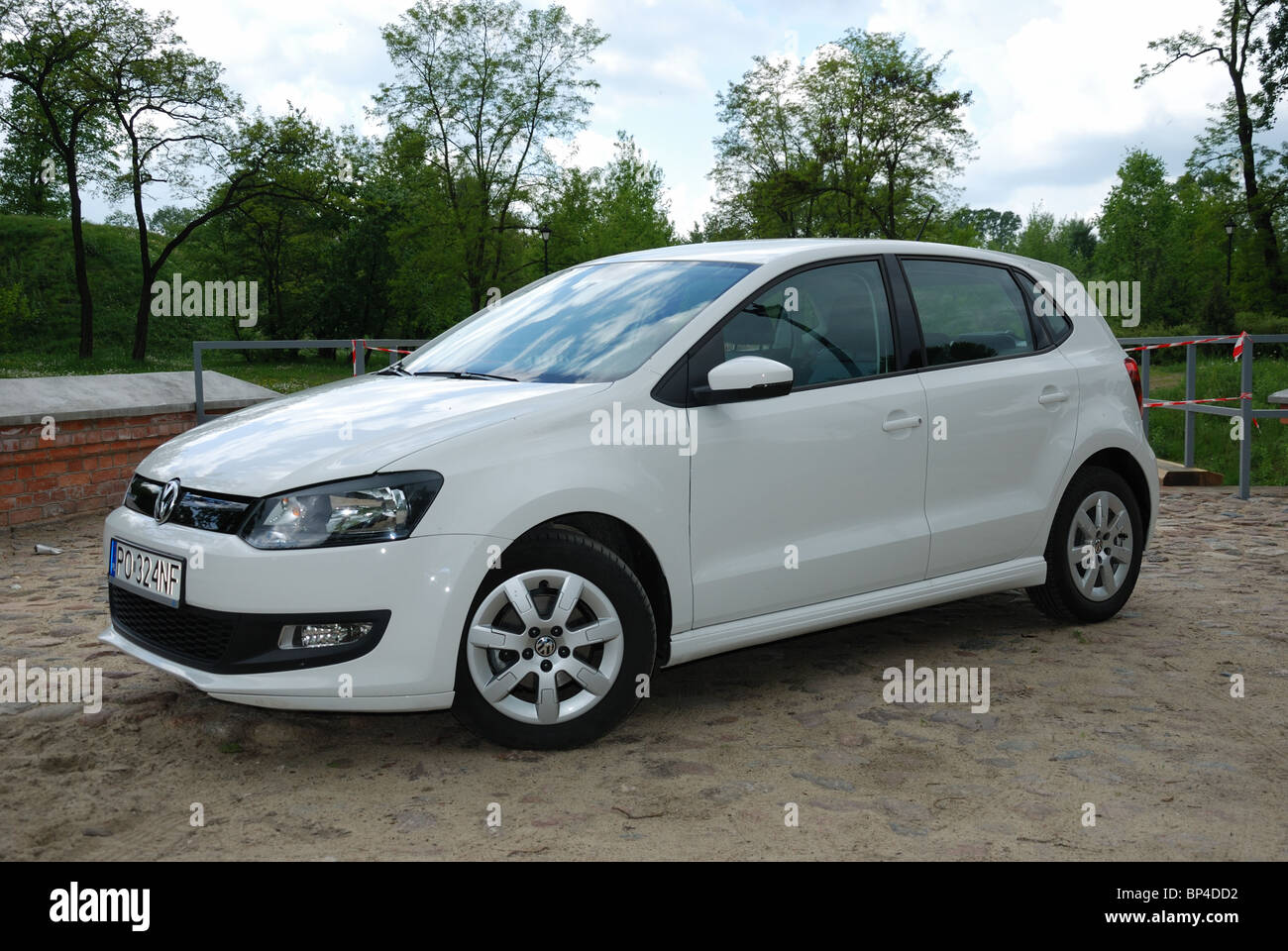 Volkswagen Polo 1.2 TDI BlueMotion - MY 2010 - white - German popular  subcompact eco city car, segment B - in a park Stock Photo - Alamy