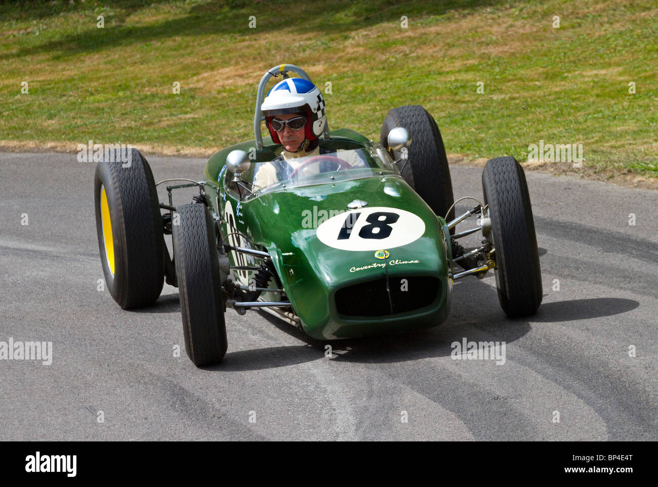 1960 Lotus-Climax 18 with driver John Chisholm at the 2010 Goodwood Festival of Speed, Sussex, England, UK. Stock Photo