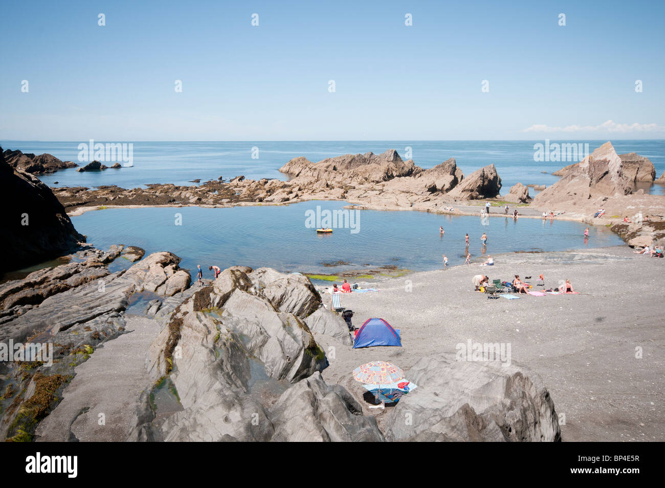 The Tunnels Beach and rock pool at North Devon Stock Photo
