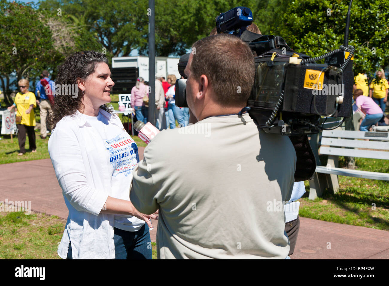 Local Tea Party organizer gives a television interview at a Tea Party political event at Farran Park in Eustis, Florida Stock Photo