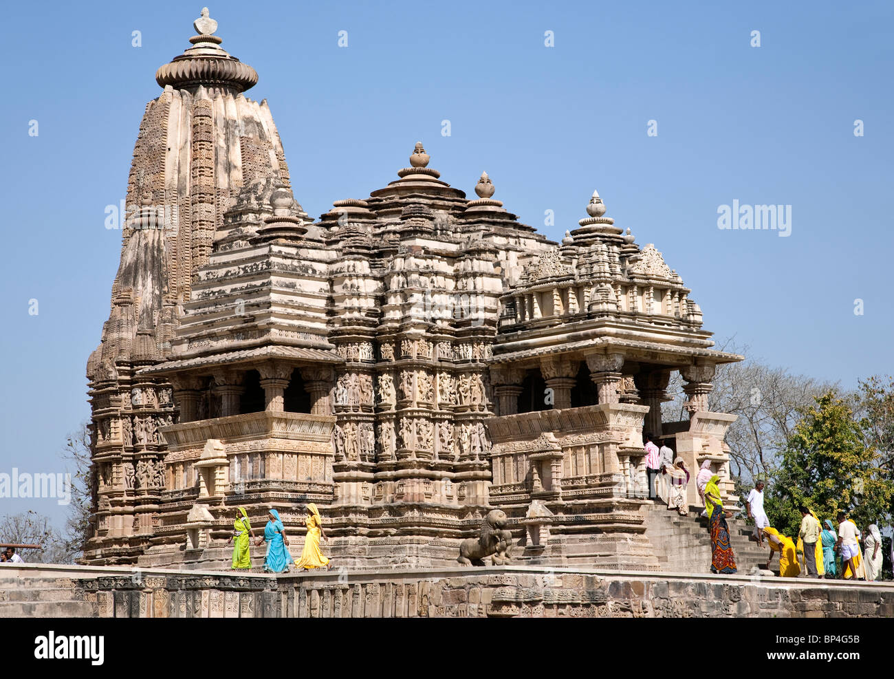 Indian people visiting Jagadambi Temple. Khajuraho (western group). Madhya Pradesh. India Stock Photo